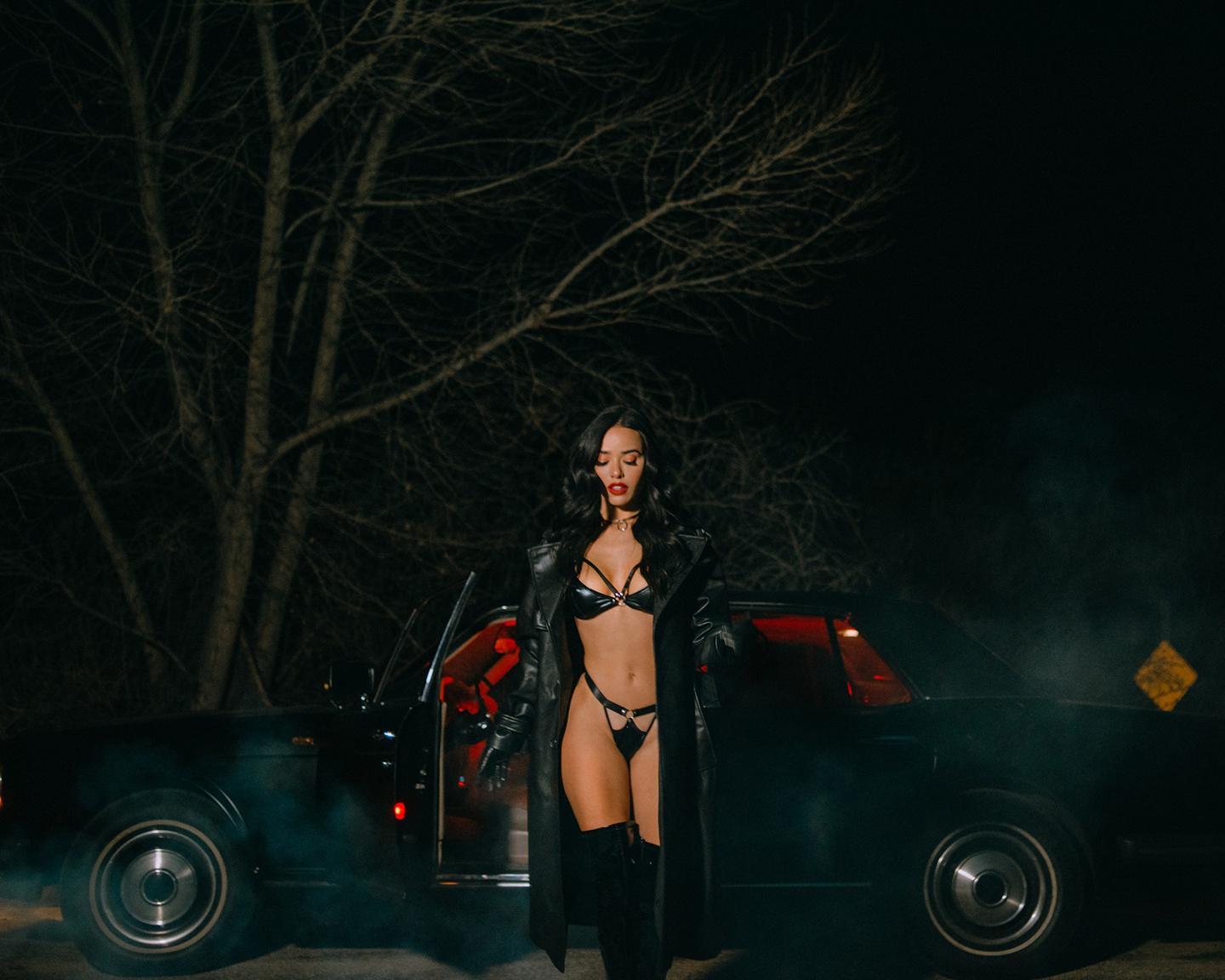 Playboy Muses (Lily Andrews in Late Night Ride): Up for a late-night drive with Lily Andrews? Get on the road with her in this dark and ultra-sexy pictorial shot by the photographer, Tina Louise. Dressed in all black leather, Lily pulls over for her close-up. Make sure to check out all of Lily Andrews’ pictorials right here.