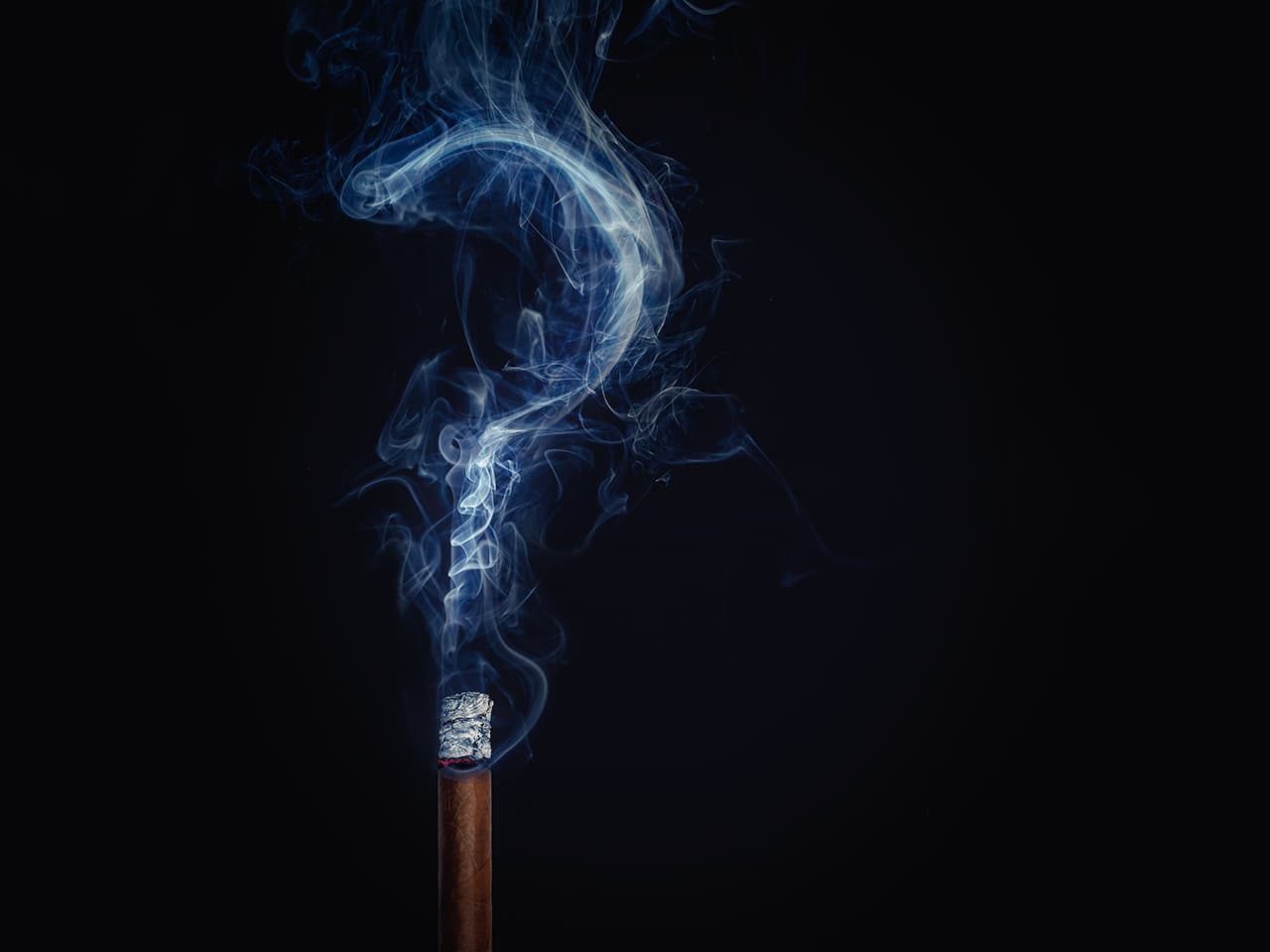 Brennt die Zigarre aus?