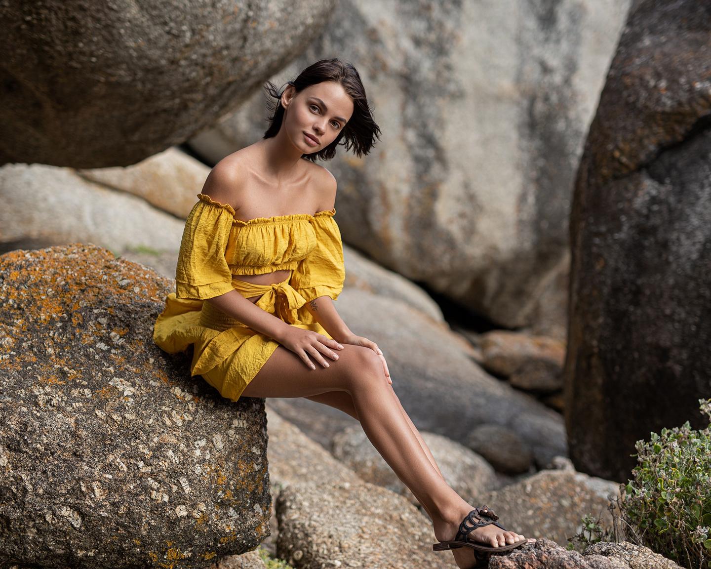 Playboy International (Ariel in Carried Away): Get carried away with the International model, Ariel. Walking atop the large rocks at the ocean’s edge, Ariel basks in the warm breeze as the photographer, Henrik Pfeifer, captures her. Dressed in all yellow, Ariel explores her surroundings while undressing for our cameras.