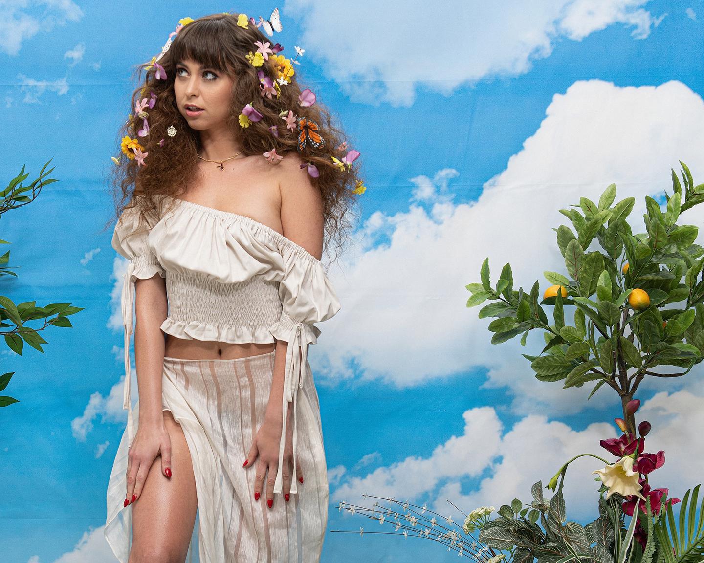 Playboy Adult Stars (Riley Reid in Spring Fling): Spring has sprung a little earlier than usual with this brand new pictorial from Riley Reid, shot by the photographer, Maddie Cordoba. With flowers in her hair, before a sky backdrop, Riley embodies the season beautifully.