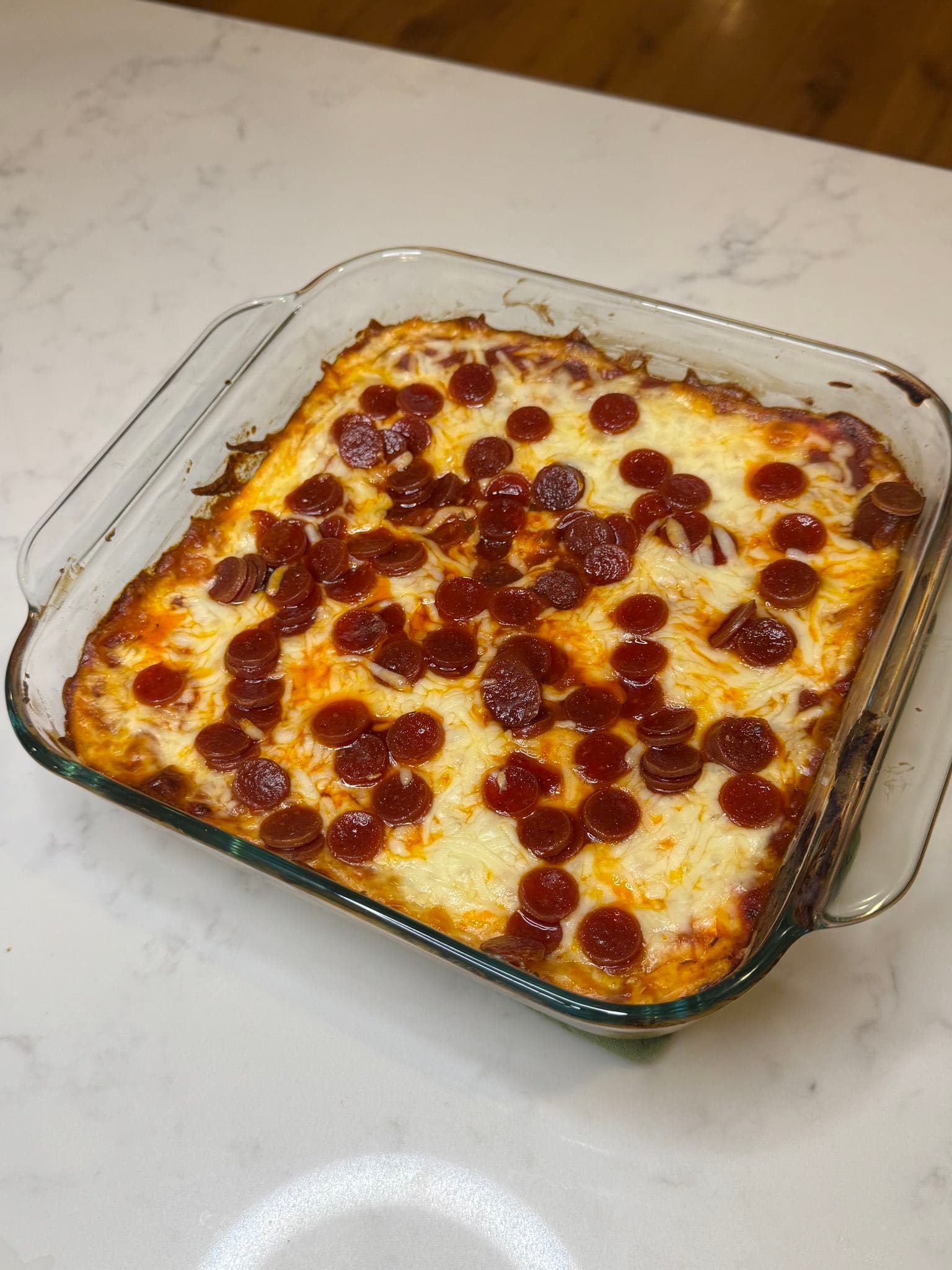 Playboy Club model Kindly Myers makes pepperoni pizza dip for upcoming Super Bowl LIX between the Kansas City Chiefs and Philadelphia Eagles.